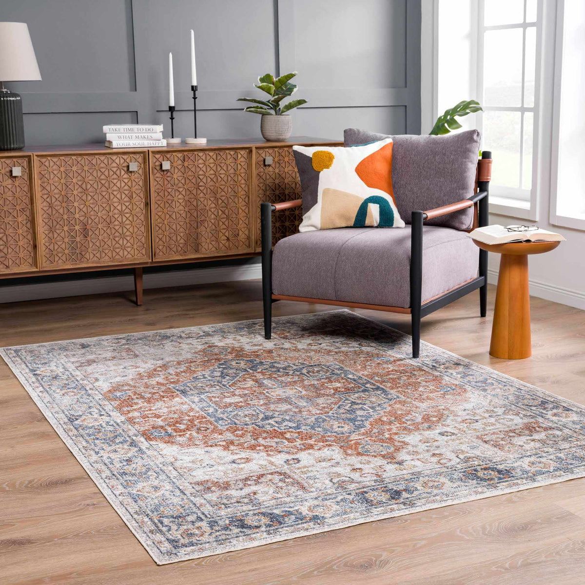 Akram Gray & Orange Washable Area Rug - Clearance, installed in a room