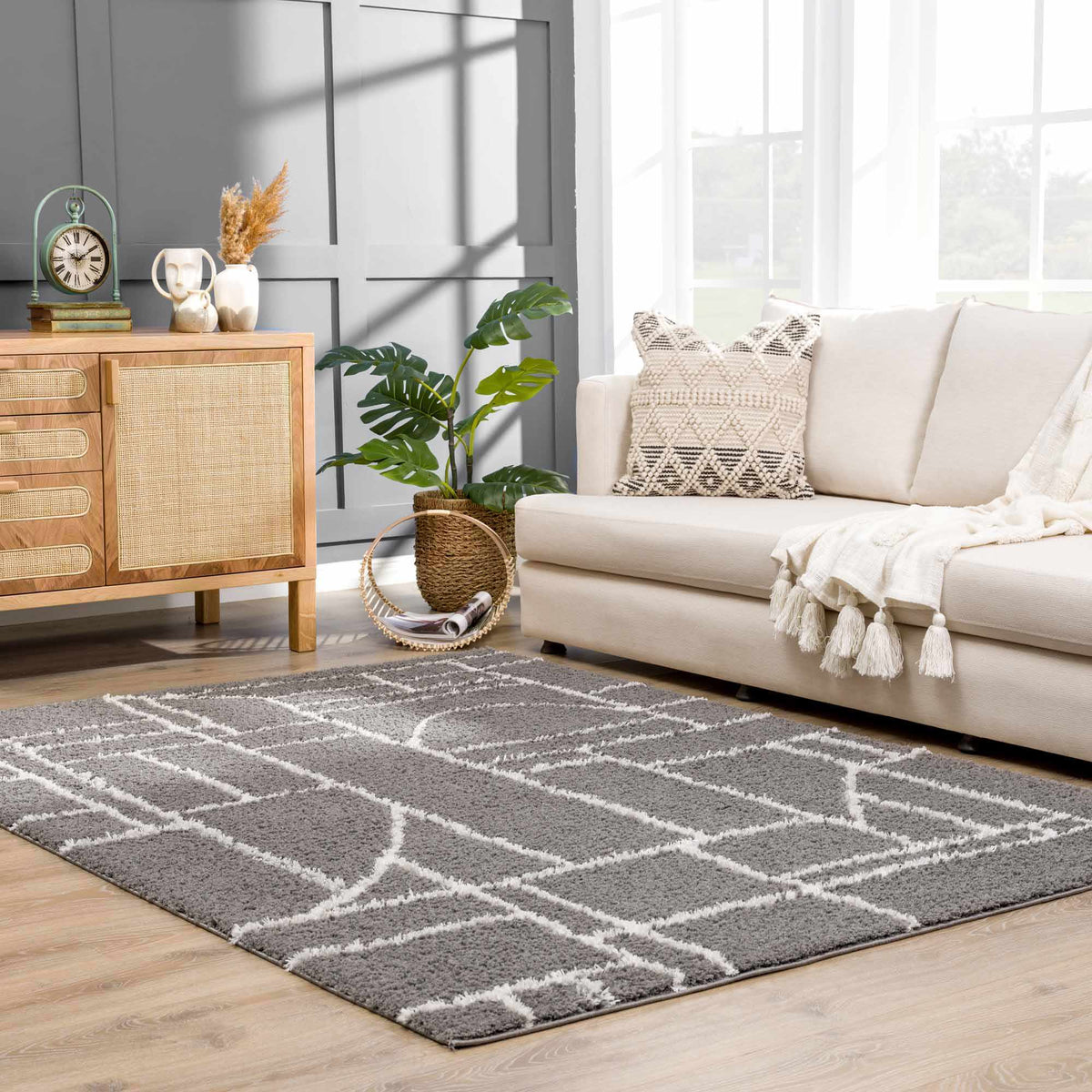 Andia Charcoal Area Rug - Clearance, installed in a room