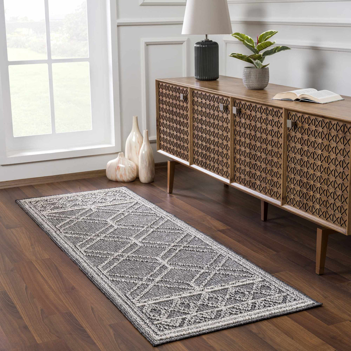 Diah Black & Bone Outdoor Area Rug - Clearance, installed in a room 3