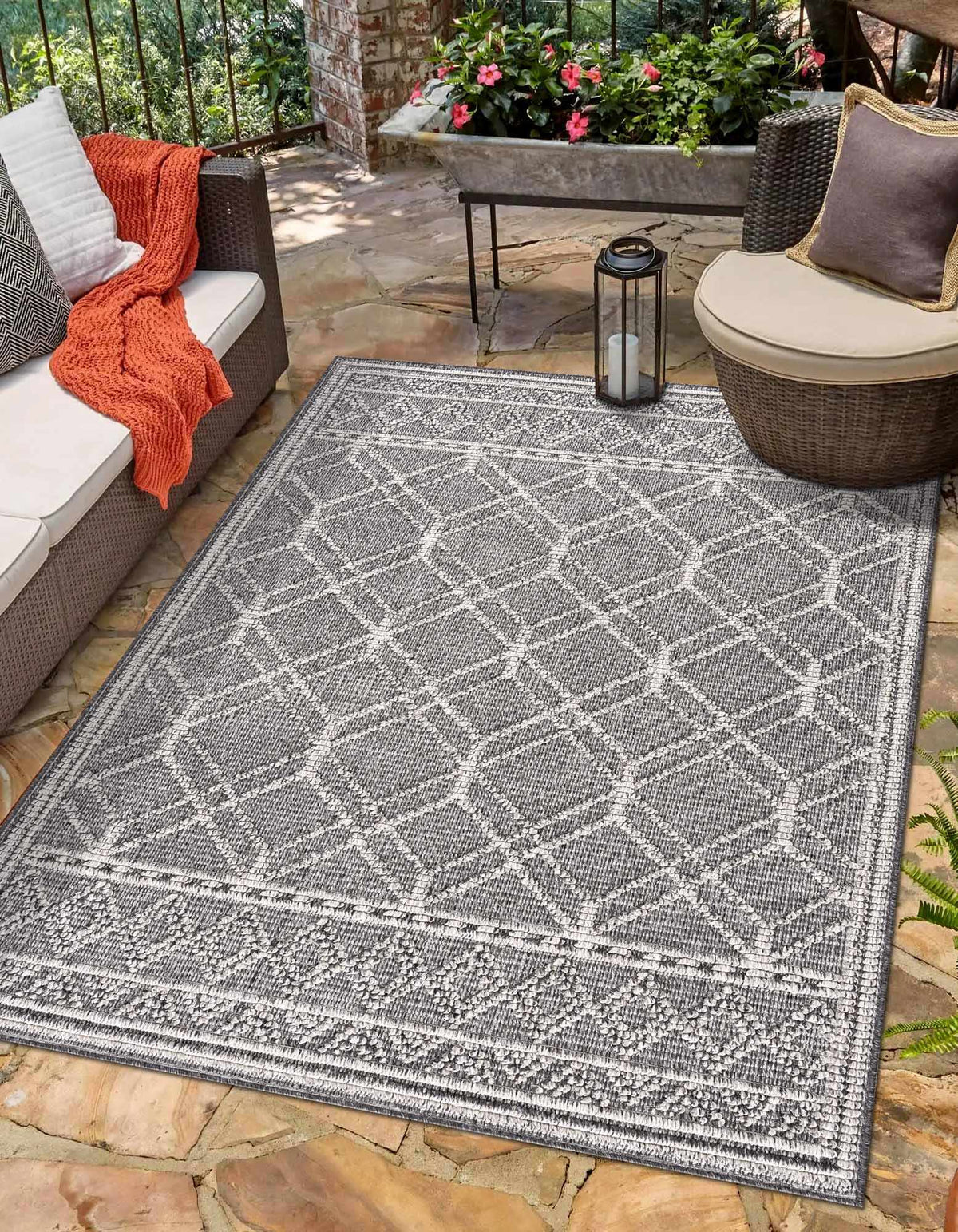 Diah Black & Bone Outdoor Area Rug - Clearance, installed in a room