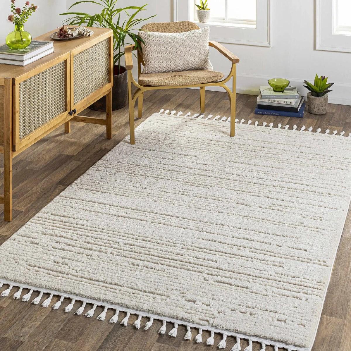Ibarra Textured Ivory High/Low Pile Rug with Tassels, installed in a room 2