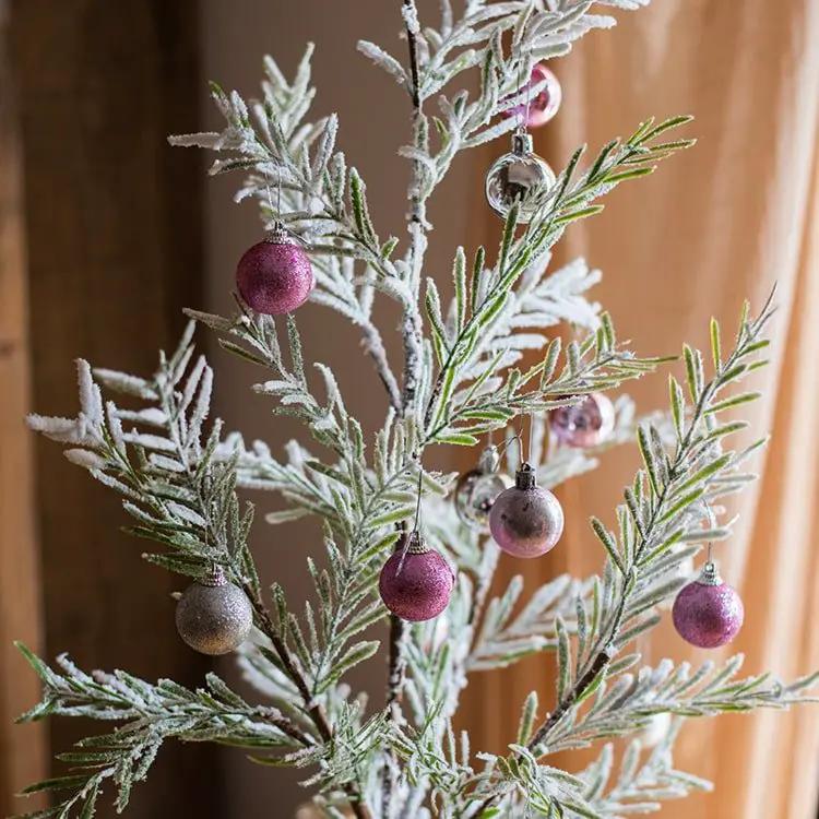 Cedar Fir Tree Snow Flocked Christmas Tree in Paper Wrapped Base by RusticReach