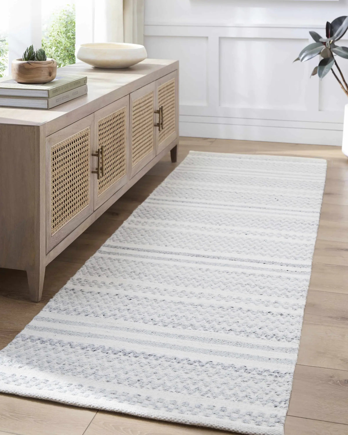 Kendi Cream Area Rug - Clearance, installed in a room 2