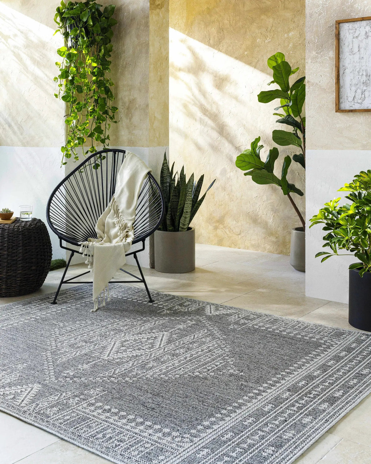 Asuman Outdoor Area Rug - Clearance, installed in a room
