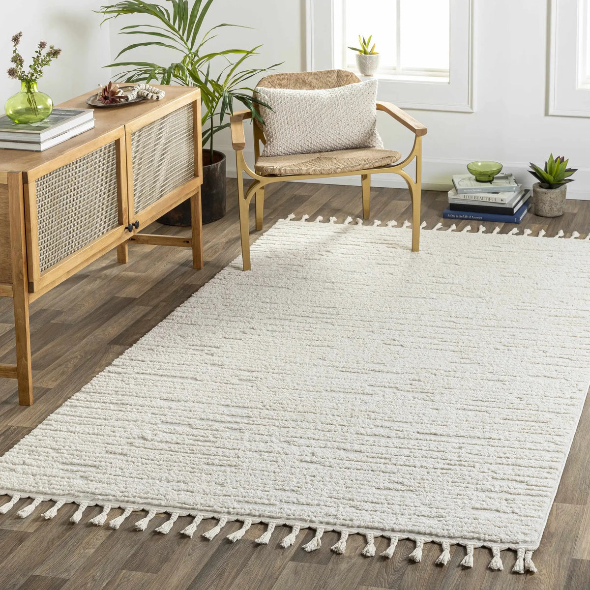 Kulu Textured Area Rug with Tassels, installed in a room 3