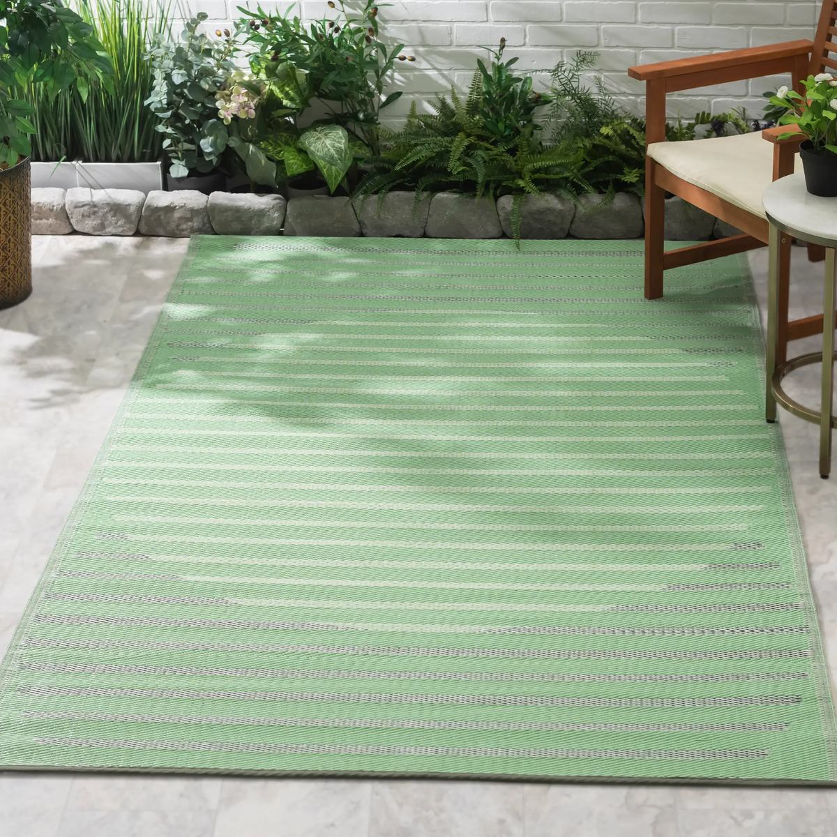 Kyoto - Green Outdoor Rug for Patio, installed in a room