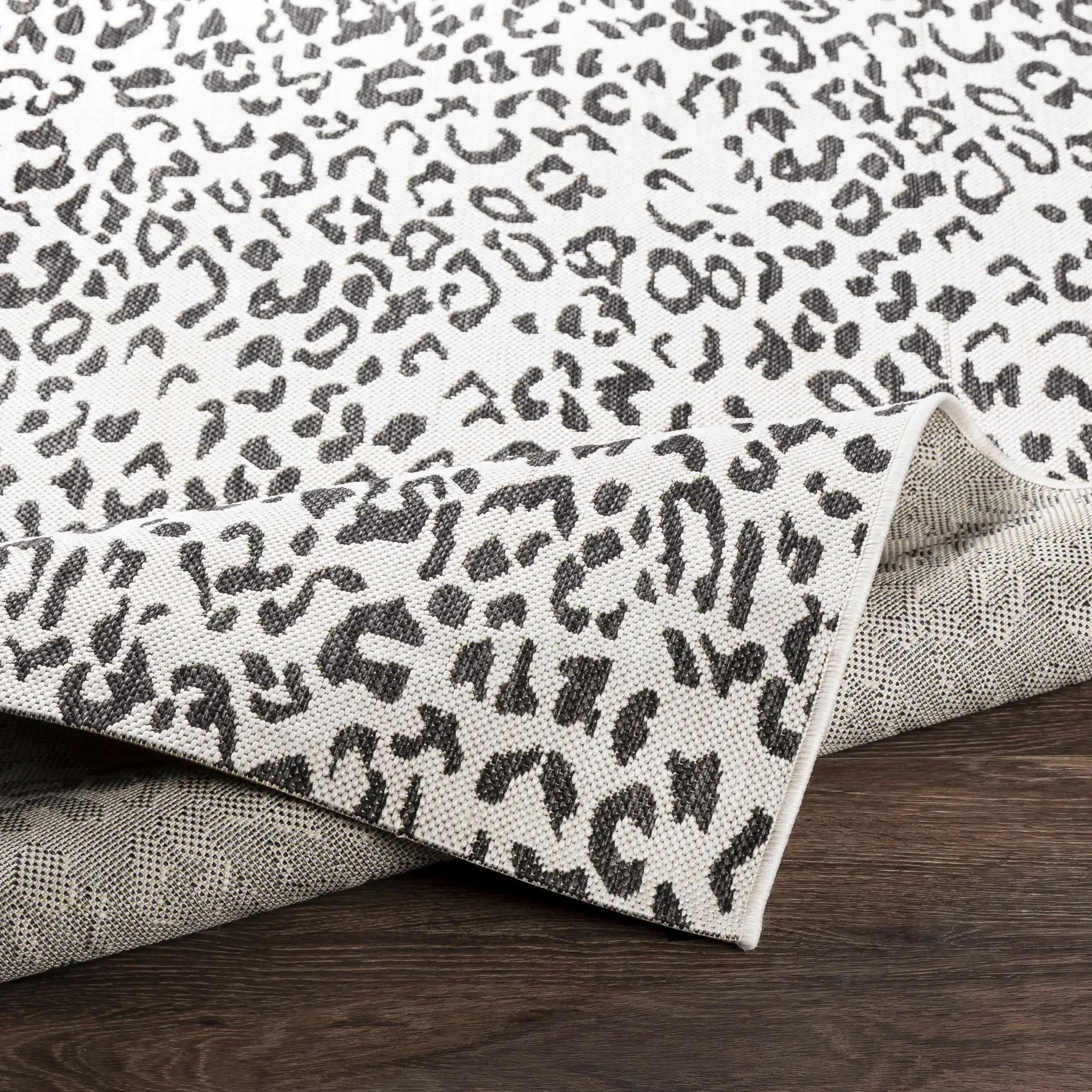 Alderbury White Leopard Print Outdoor Rug by Boutique Rugs
