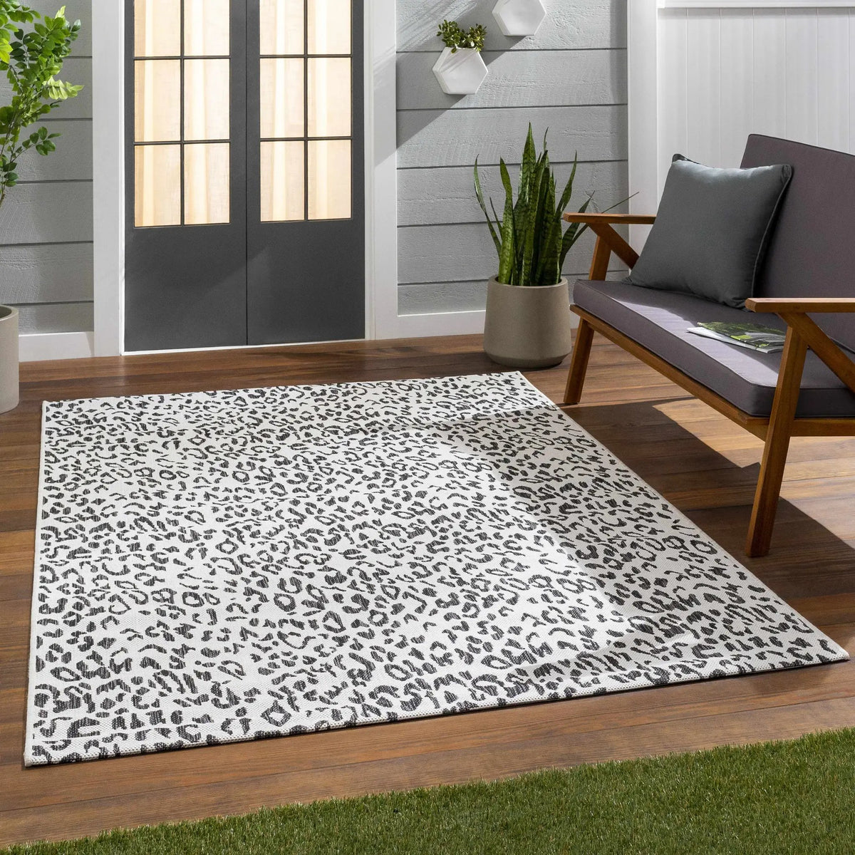 Alderbury White Leopard Print Outdoor Rug, installed in a room 4