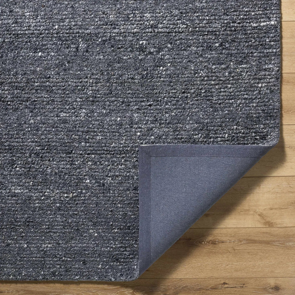 Winta Black Wool Area Rug, photo 6 of 10