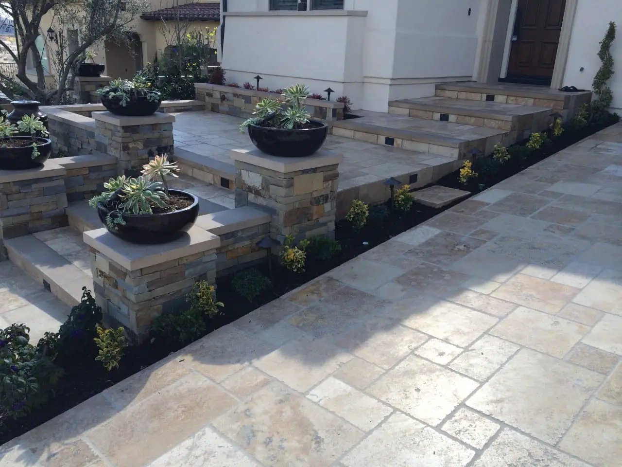 Tuscany Porcini Brushed Travertine Pool Copings 12x24 in a finished room