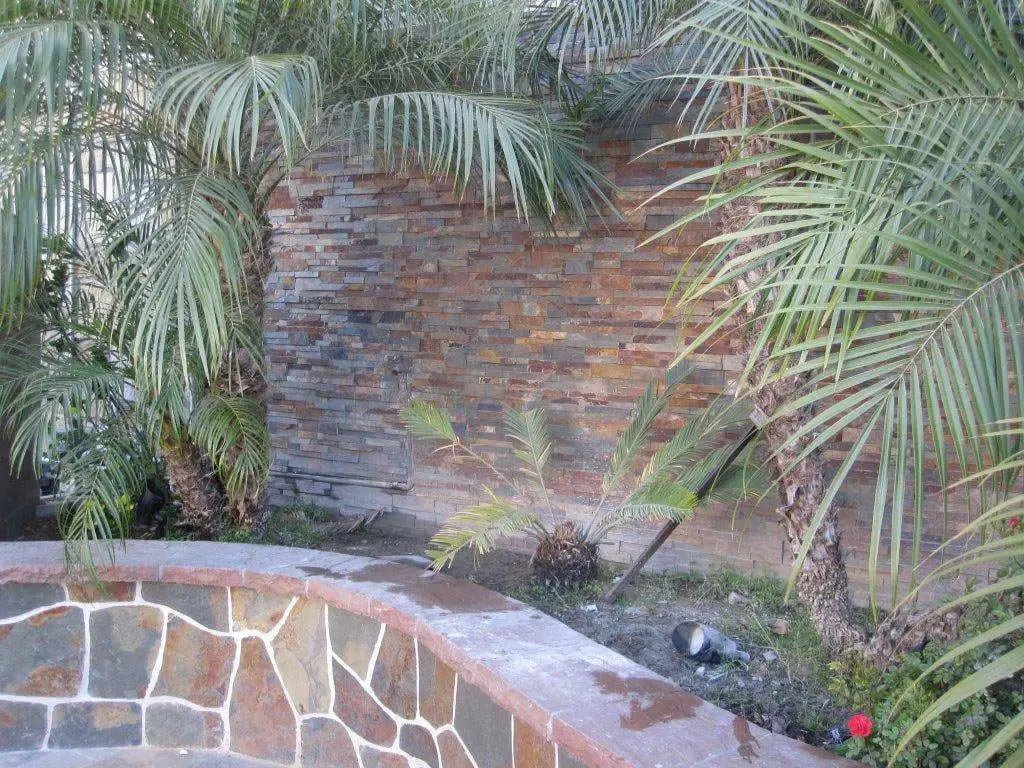 Gold Rush Split Face Corner Slate Pavers 6x12 in a finished room
