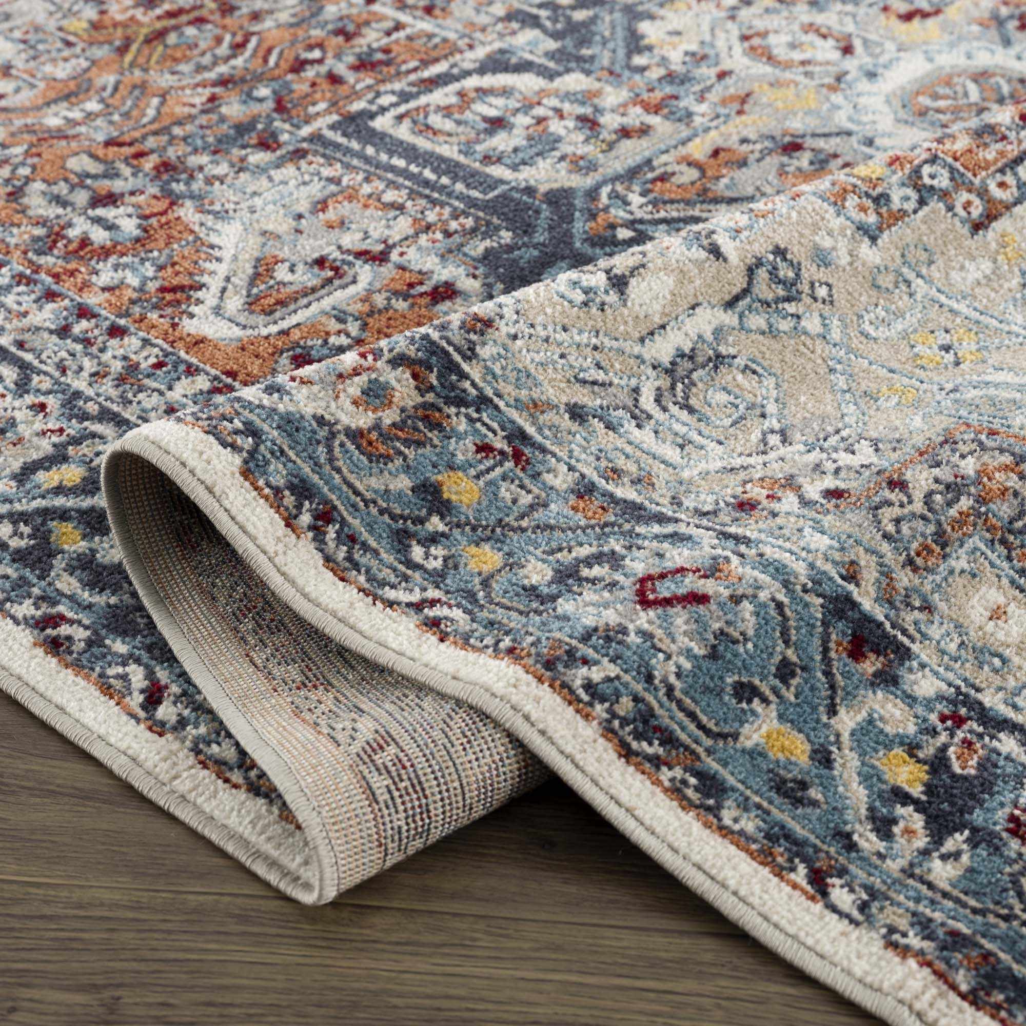 Cabacungan Blue & Rust Washable Area Rug by Hauteloom
