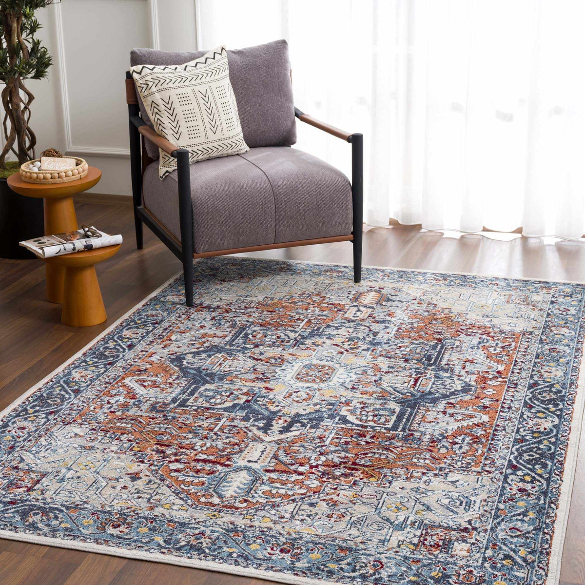 Cabacungan Blue & Rust Washable Area Rug - Clearance, installed in a room