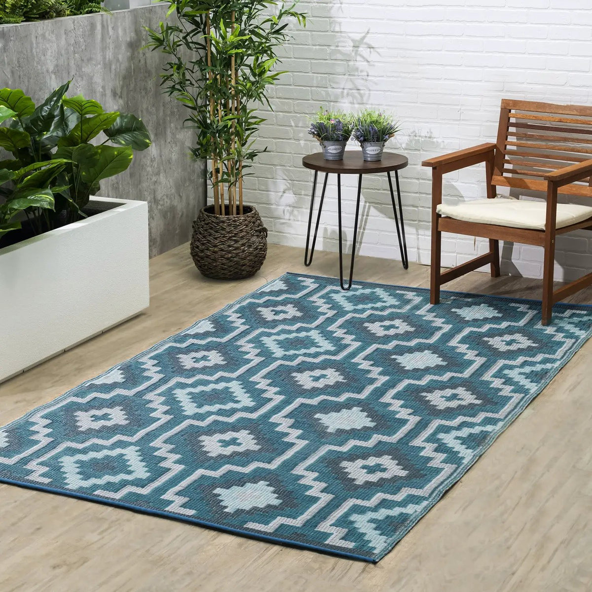Lhasa - Teal Outdoor Rug for Patio FINAL SALE, installed in a room 2