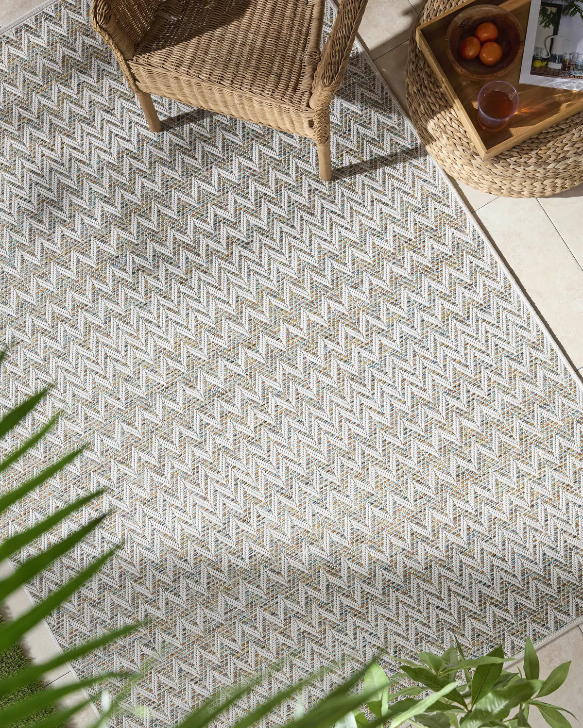Alazne Ivory Outdoor Area Rug, installed in a room