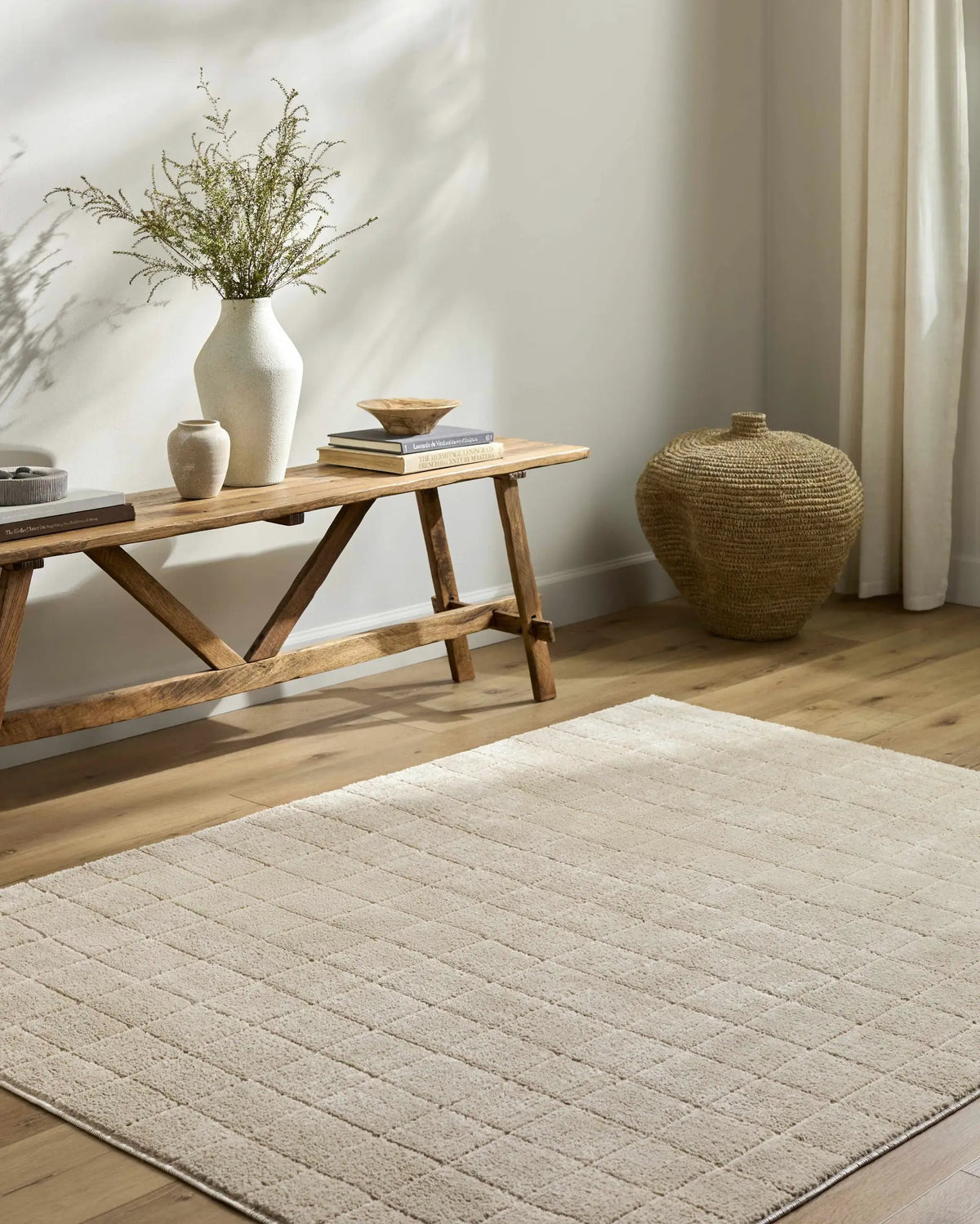 Cascade Checkered Beige Area Rug, installed in a room