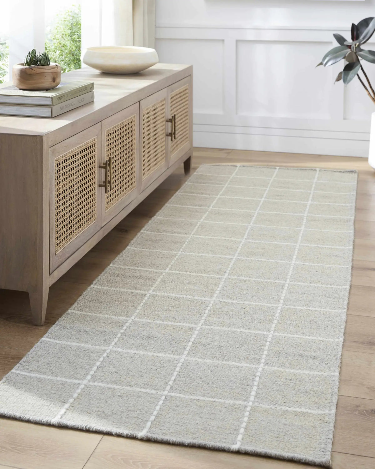 Nissa Sterling Gray Area Rug, installed in a room