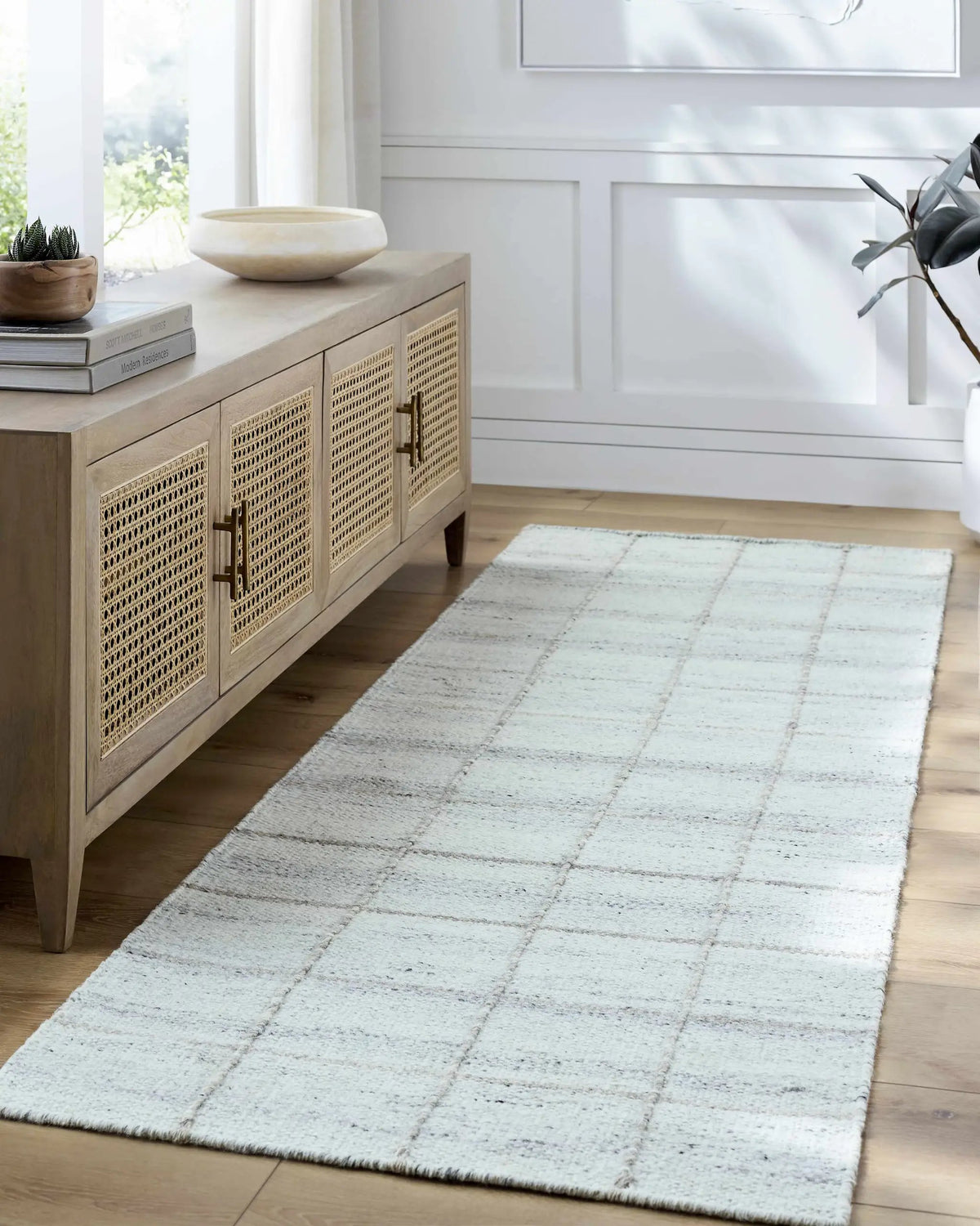 Nissa Light Gray Checkered Wool Rug, installed in a room