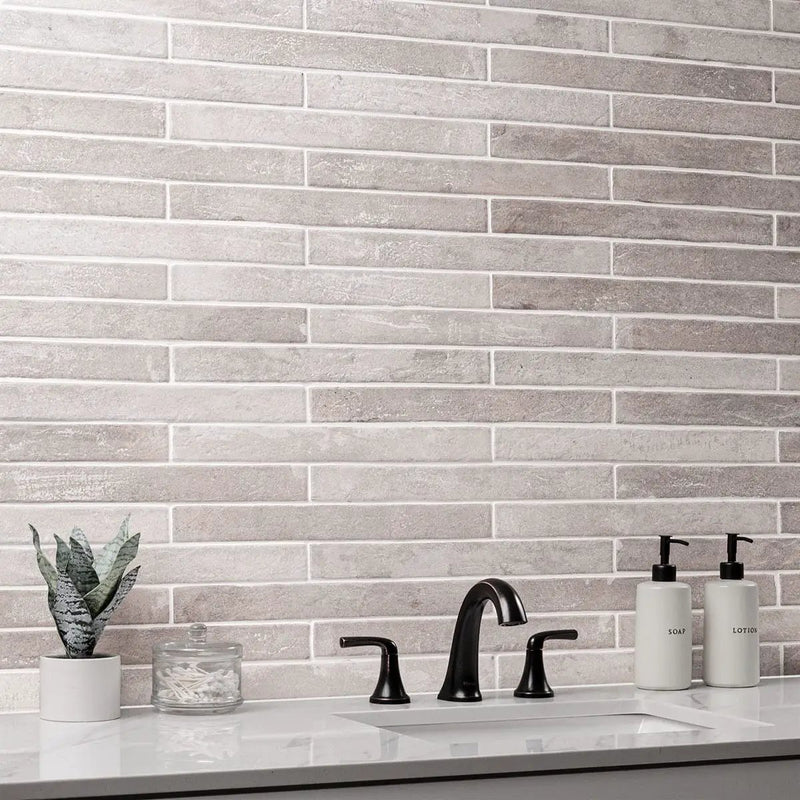 Brickstone Ivory Porcelain Tile 2x10 Matte Brick Mosaics 2x18 in a finished room