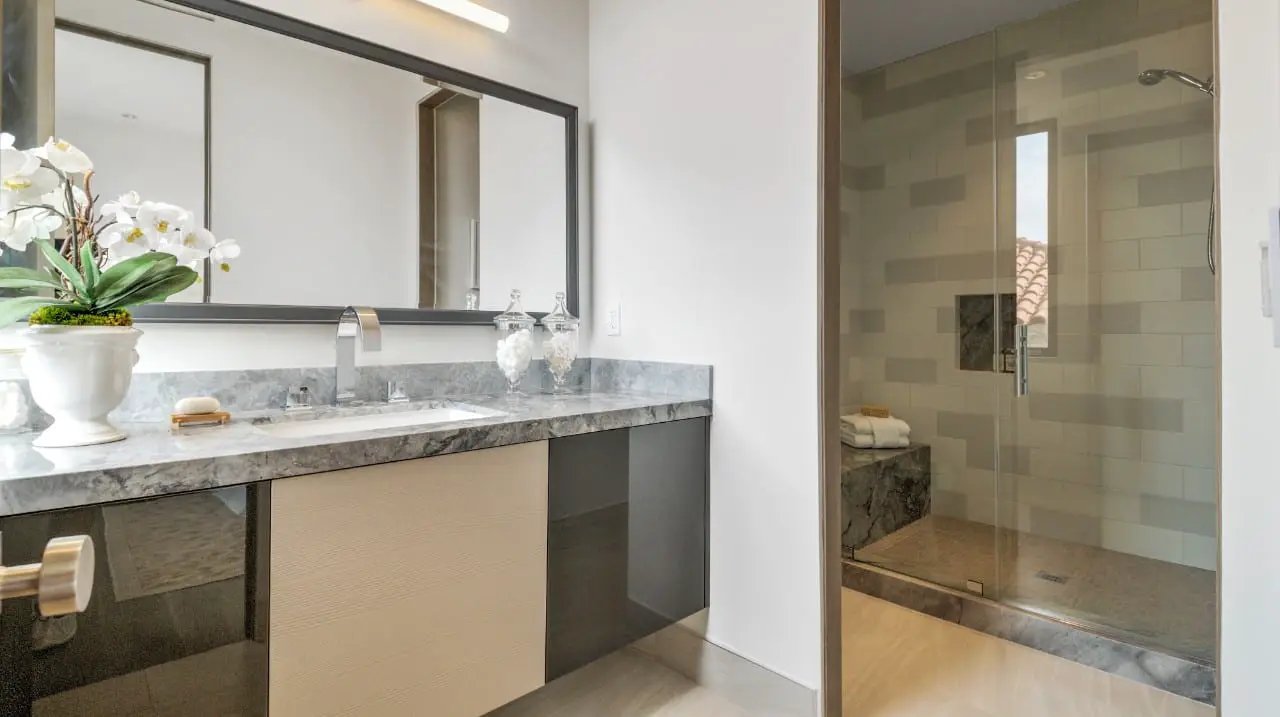 Dimensions Gris Matte Porcelain Mosaics 2x2 in a finished room