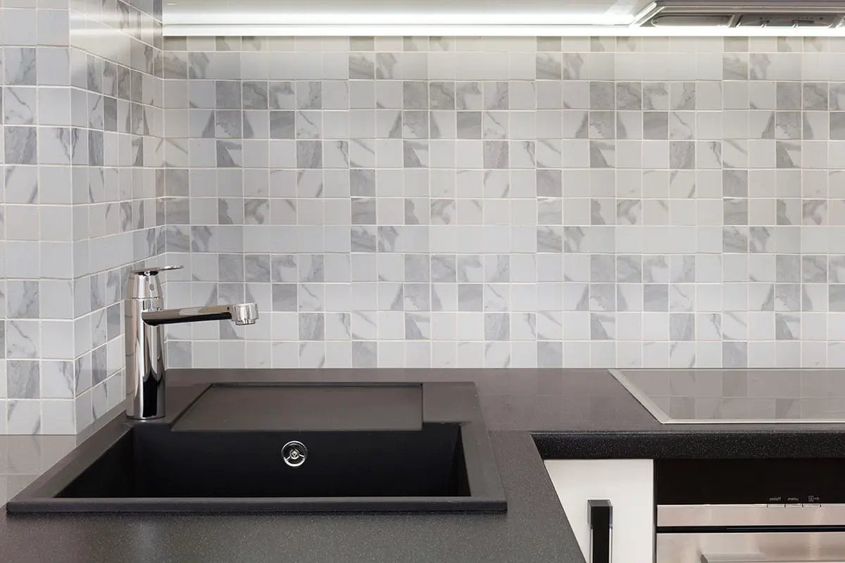 Eden Statuary Matte Marble Look Porcelain Mosaics 2x2 2 in a finished room