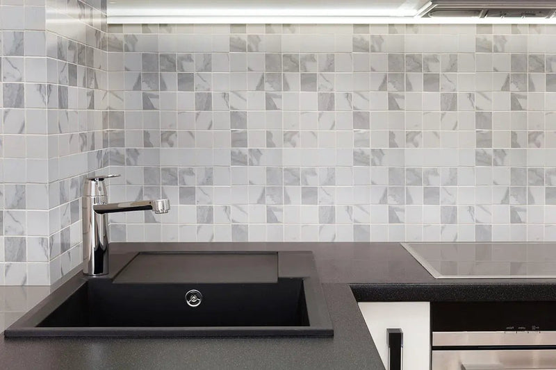 Eden Statuary Matte Marble Look Porcelain Mosaics 2x2 in a finished room