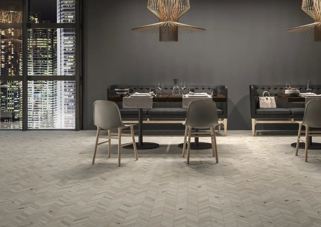 Havenwood Dove Matte Chevron Porcelain Mosaics 12x15 in a finished room