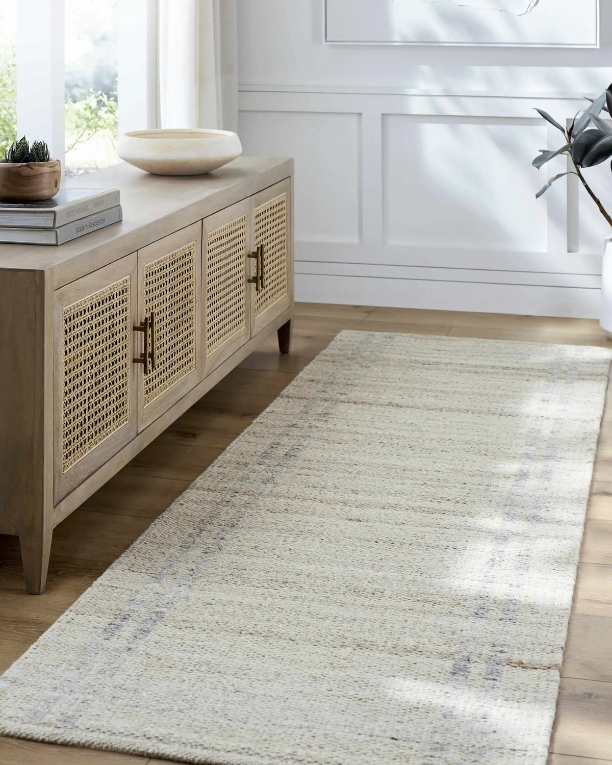 Nimue Tan Area Rug, installed in a room 2