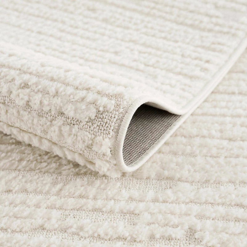 Kulu Textured Area Rug with Tassels by Boutique Rugs