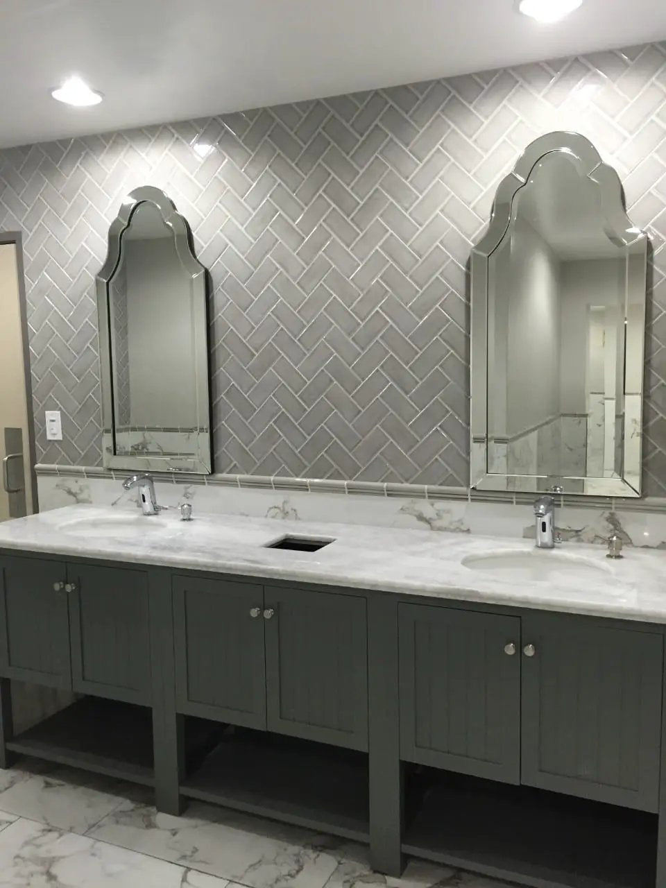 Pietra Statuario Polished Marble Look Porcelain Tiles 12x24 in a finished room
