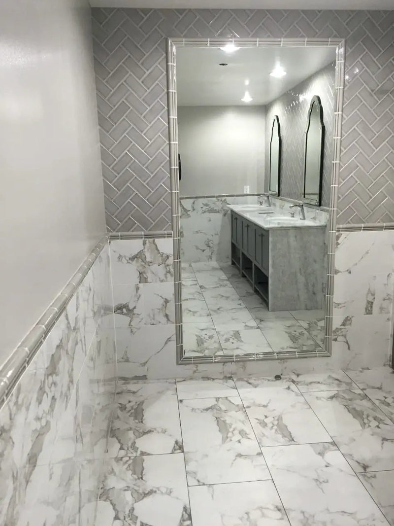Pietra Statuario Polished Marble Look Porcelain Tiles 12x24 in a finished room