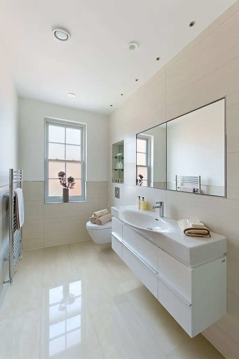 Praia Grey Polished Porcelain Tiles 12x24 in a finished room