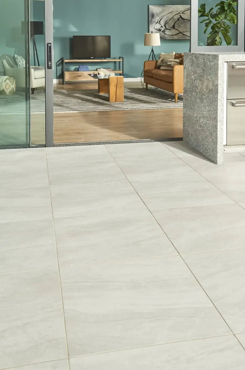 Praia Grey Matte Marble Look Porcelain Pavers 24x24 in a finished room