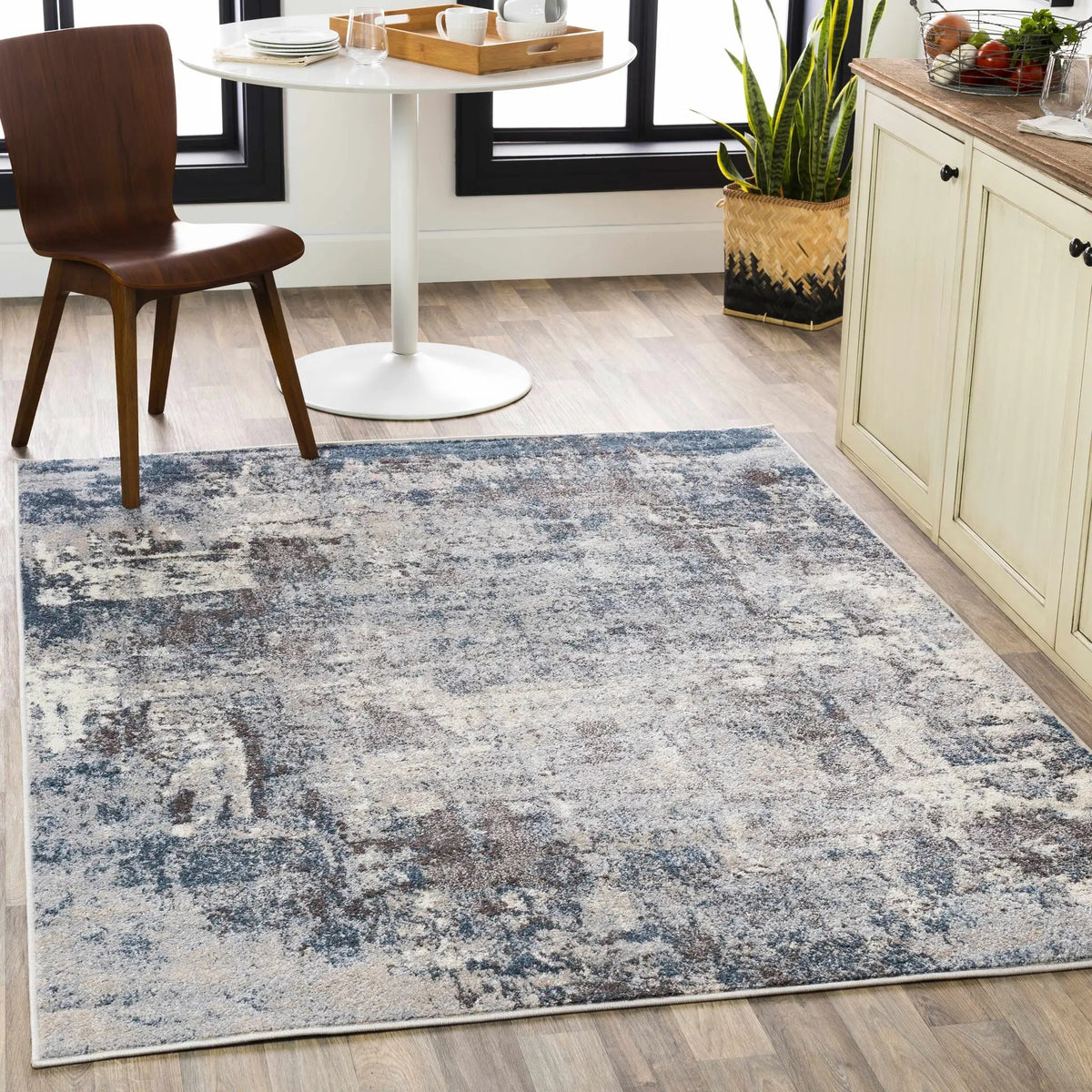 Netherfield Abstract Gray Rug, installed in a room