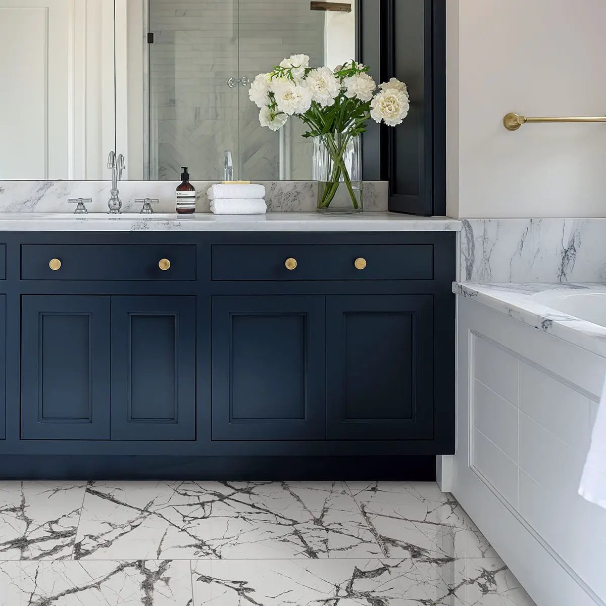 Exotika Lux Iceberg 24x48 Polished Marble Look Porcelain Tiles 48x48 in a finished room