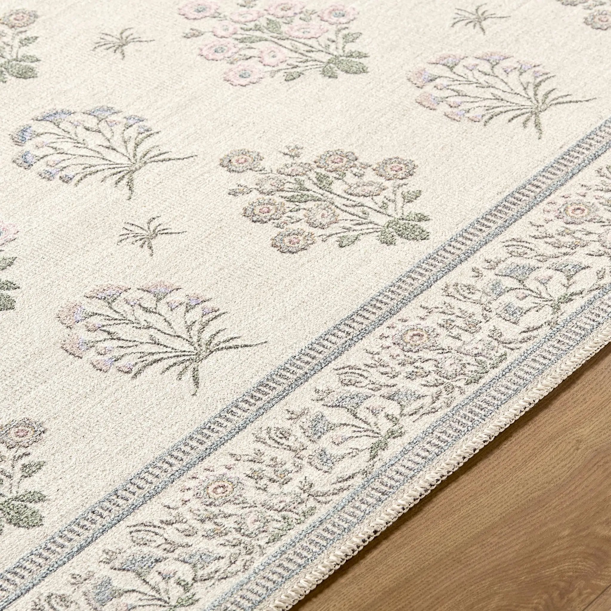 Aquene Ivory Washable Area Rug by Boutique Rugs