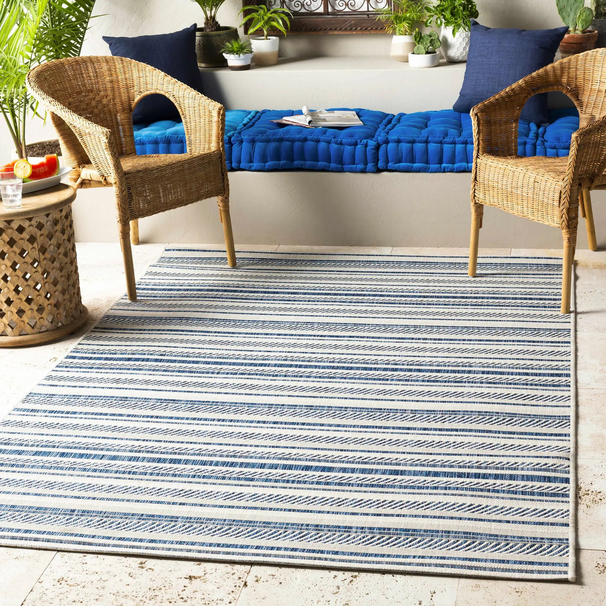 Olin White&Blue Striped Nordic Outdoor Rug, installed in a room