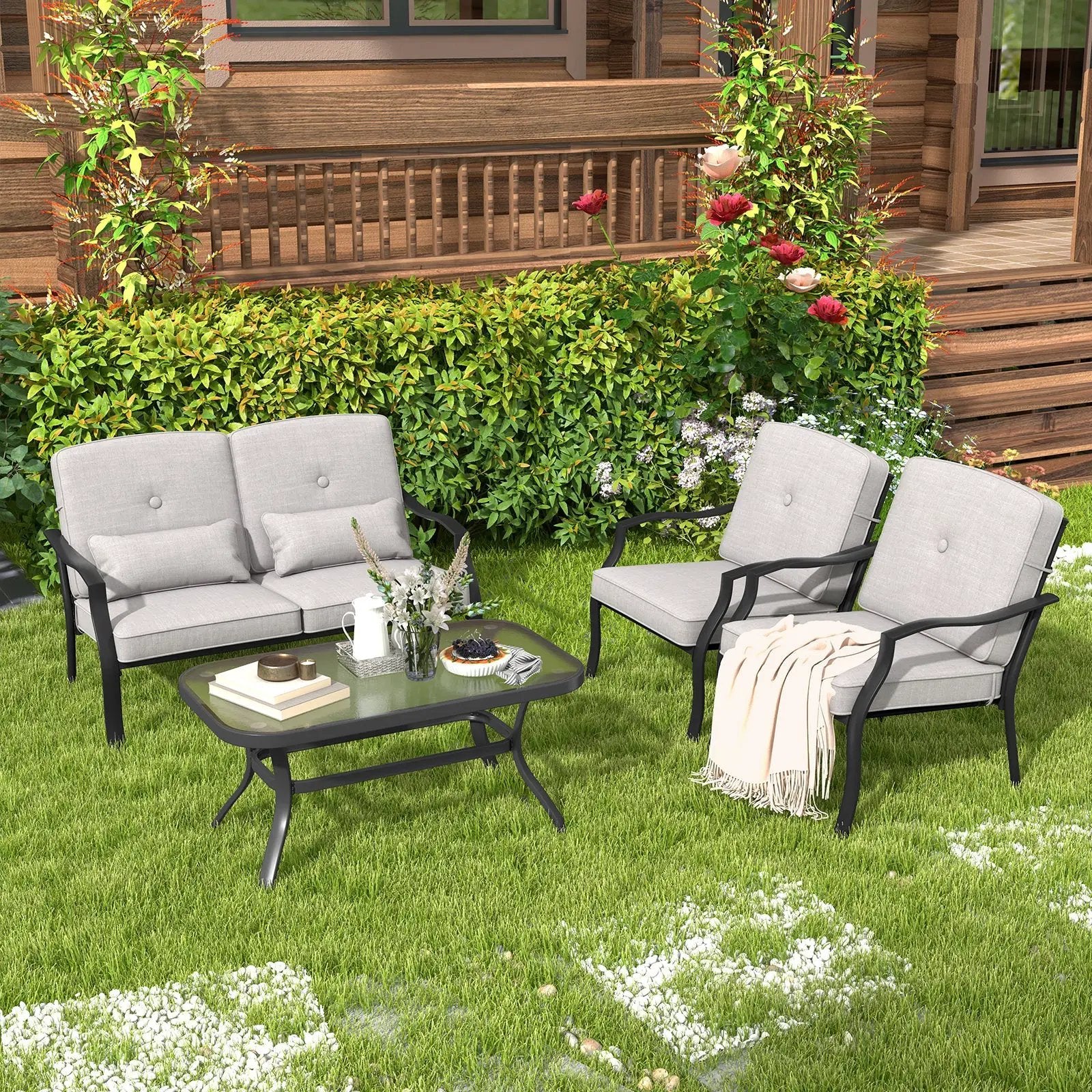 4 Pieces Outdoor Conversation Set with Seat Back Cushions and Waist Pillows by DirectDeals