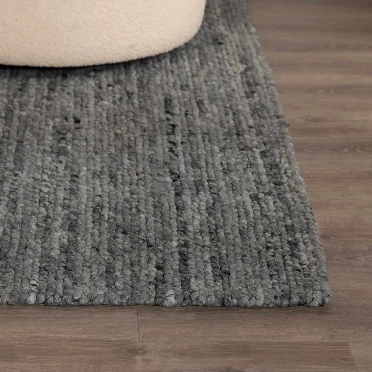 Olisa Charcoal Wool Area Rug, installed in a room 4
