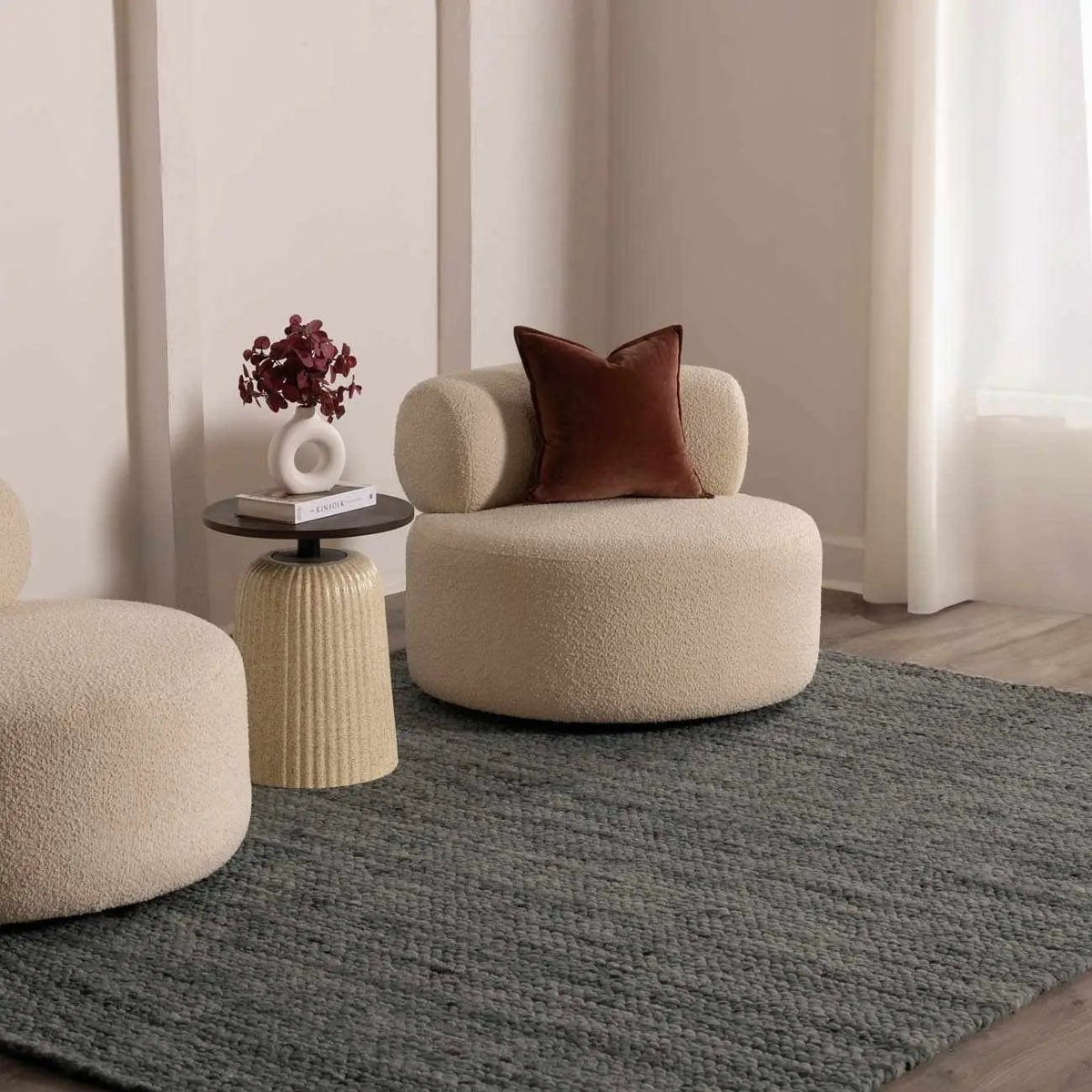 Olisa Charcoal Wool Area Rug, installed in a room
