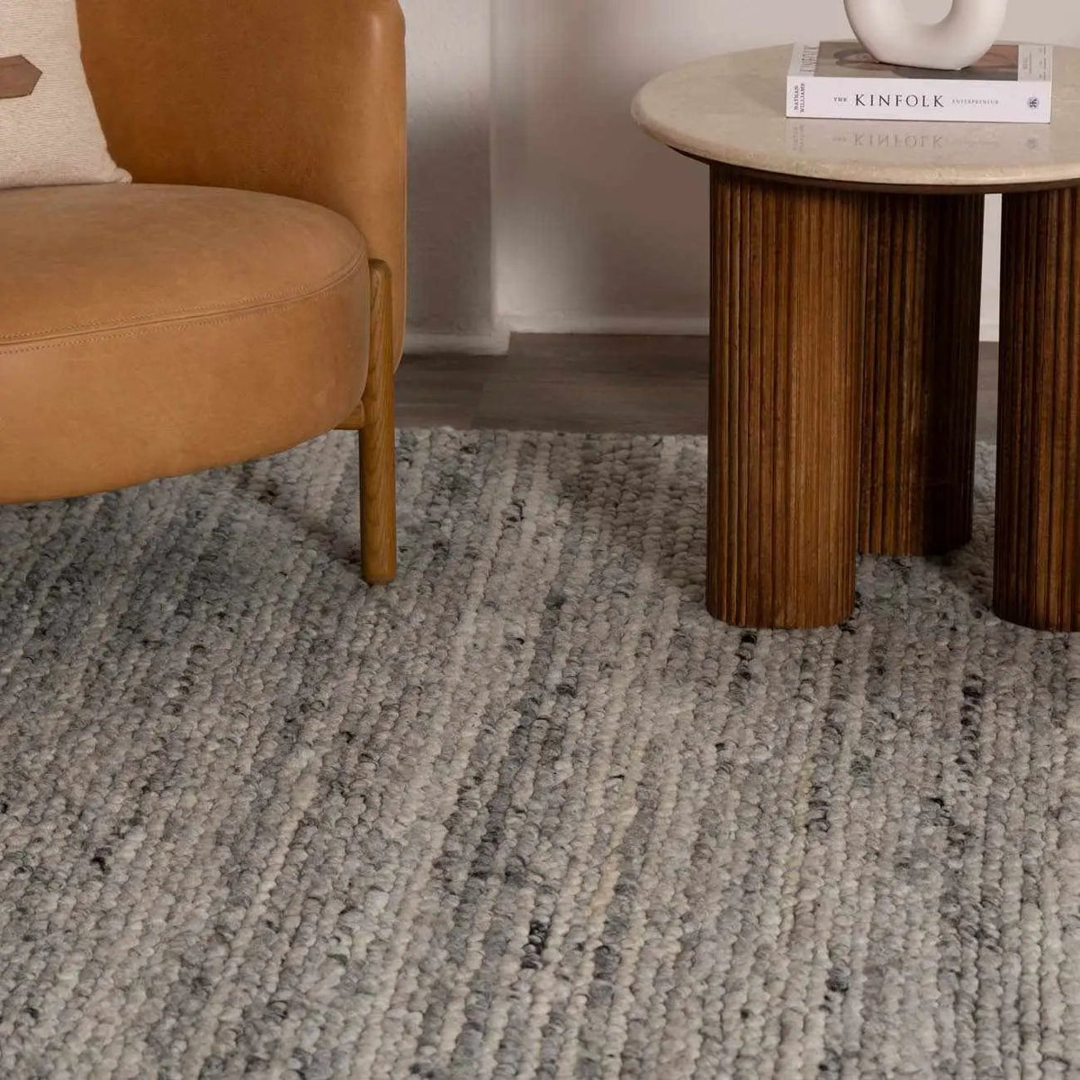 Olisa Gray Wool Area Rug, installed in a room 5