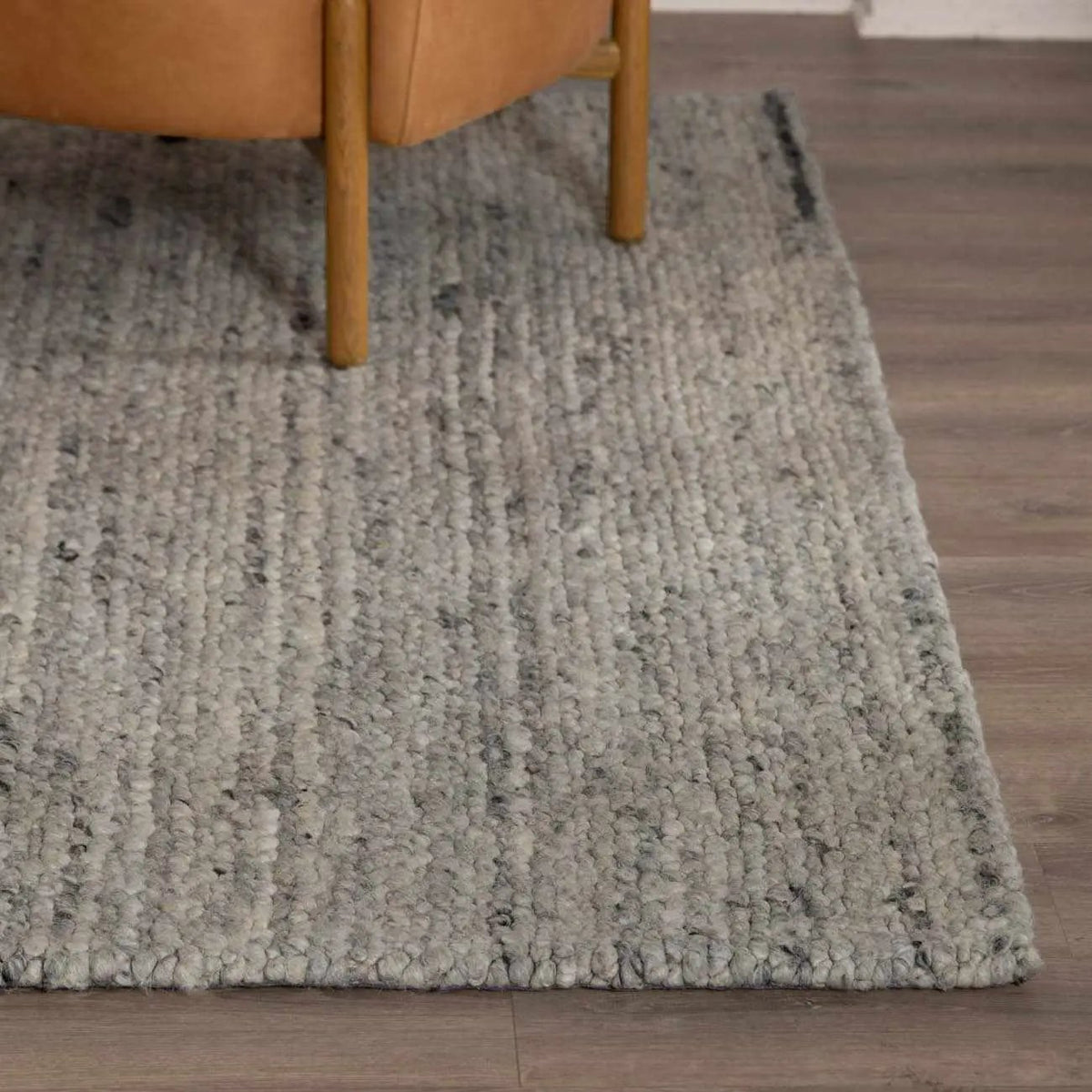Olisa Gray Wool Area Rug, installed in a room 4