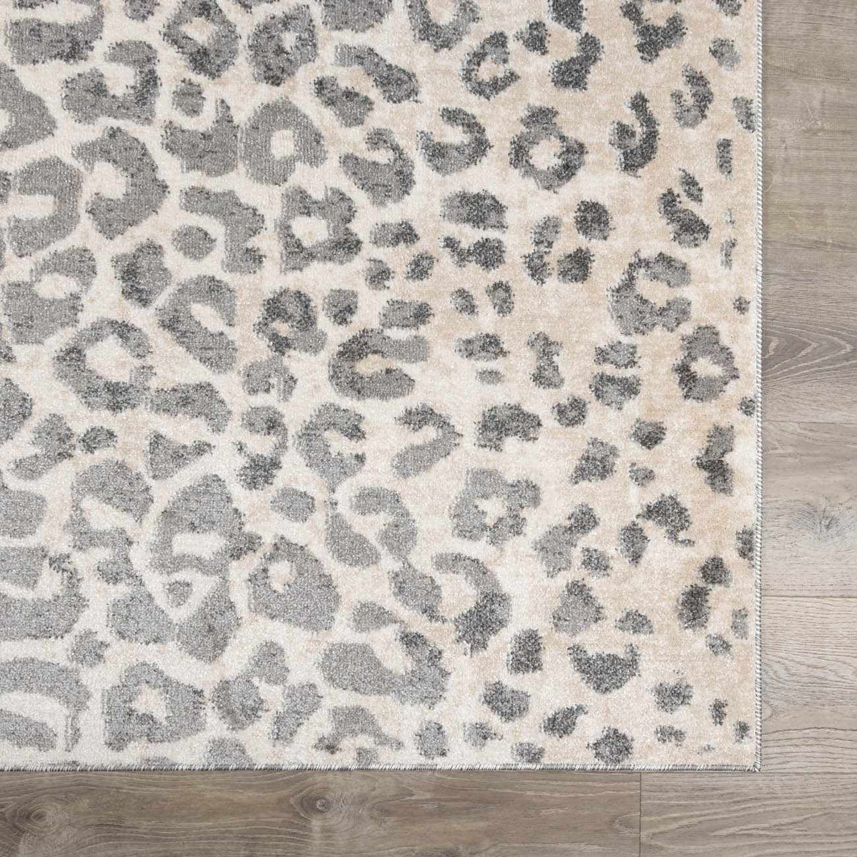 Beige Liversedge Leopard Print Area Rug, sample swatch