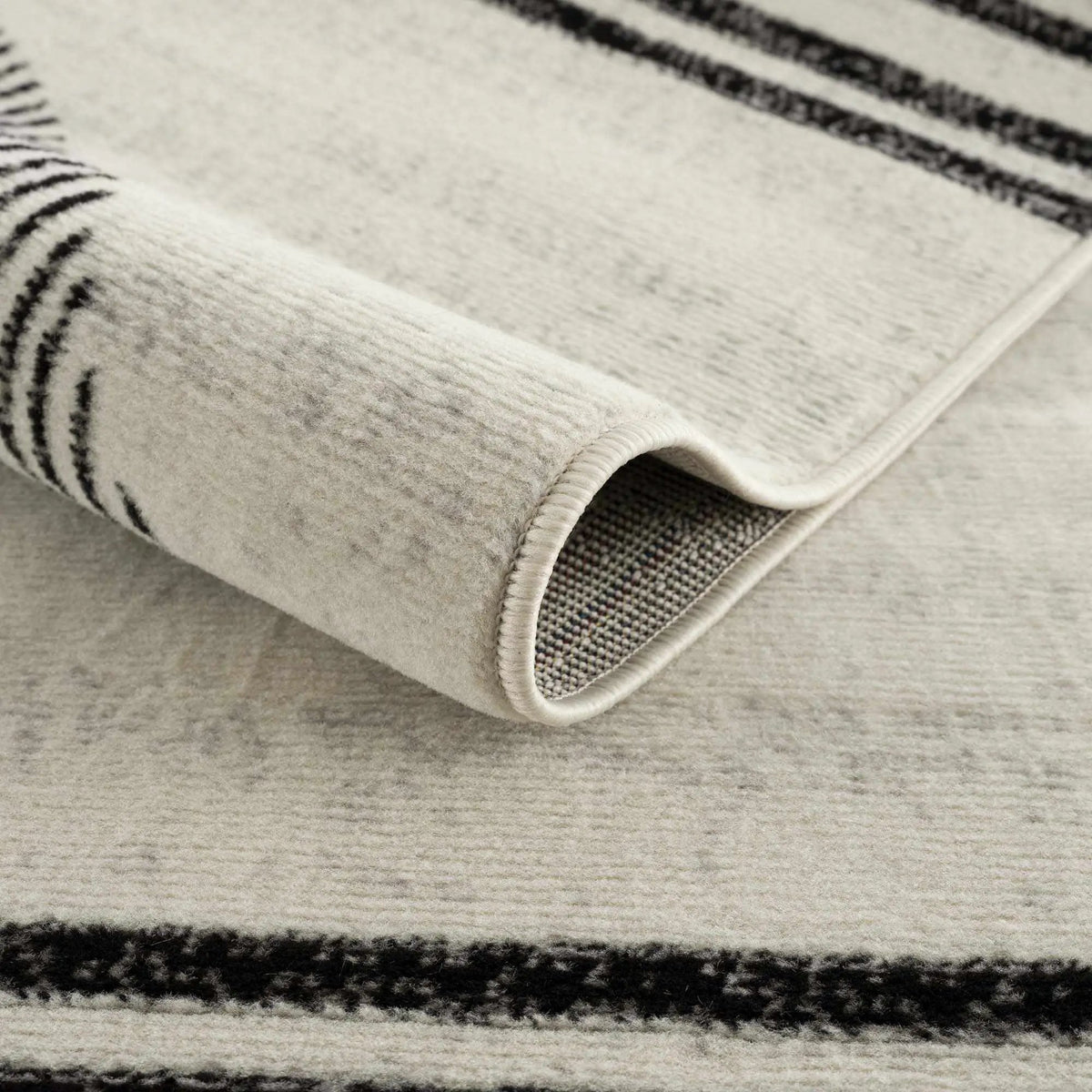 Angus Abstract Black and White Area Rug, photo 9 of 16