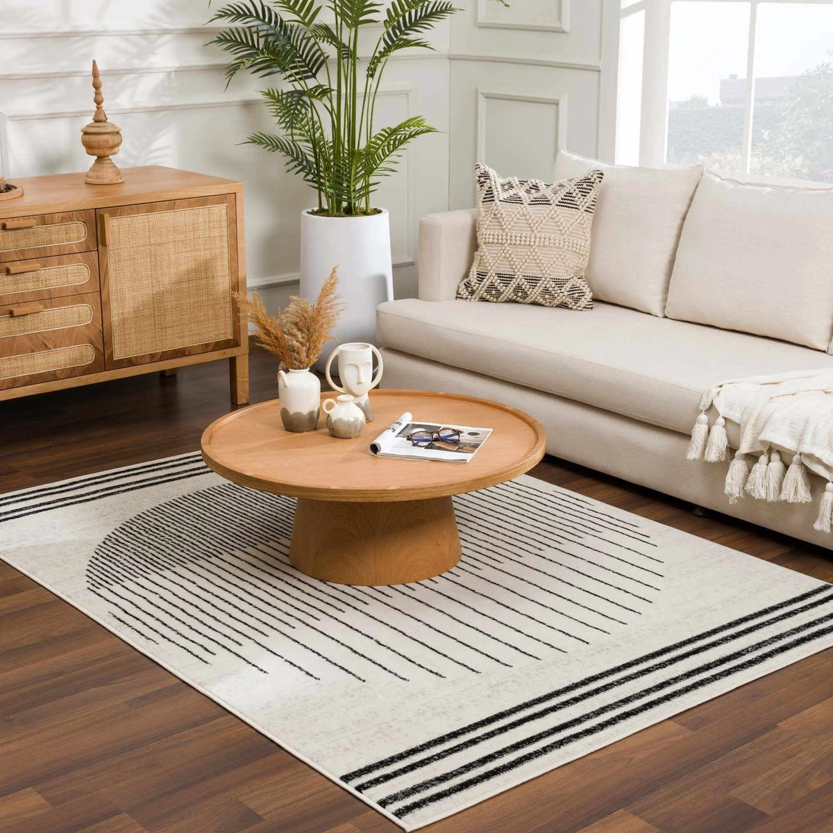 Angus Abstract Black and White Area Rug, installed in a room 2