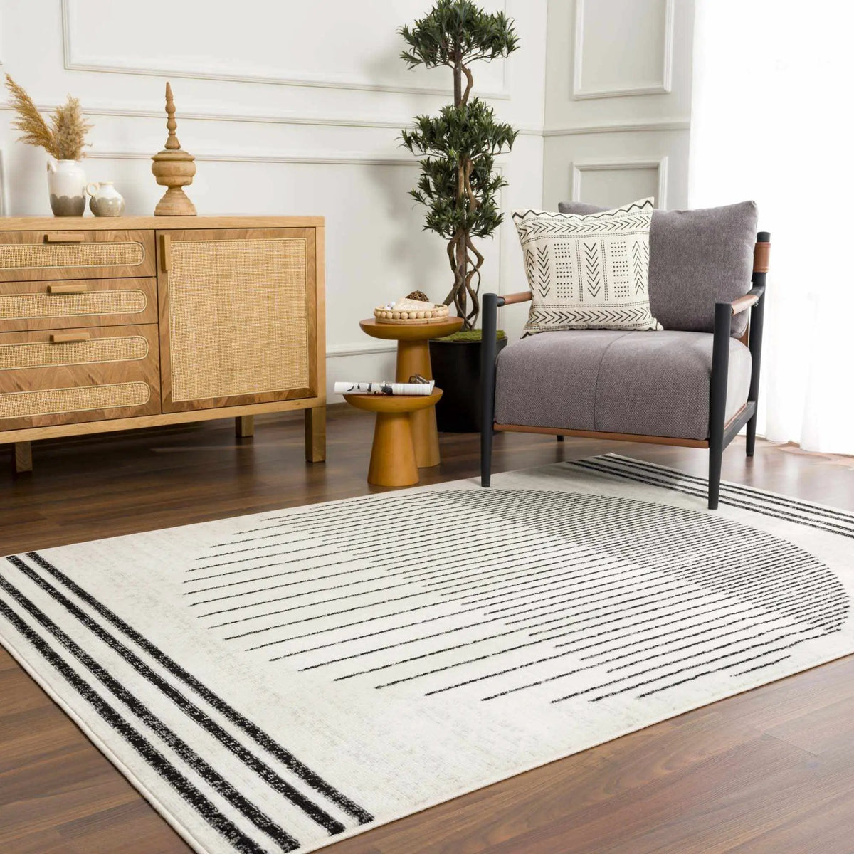 Angus Abstract Black and White Area Rug, installed in a room 5