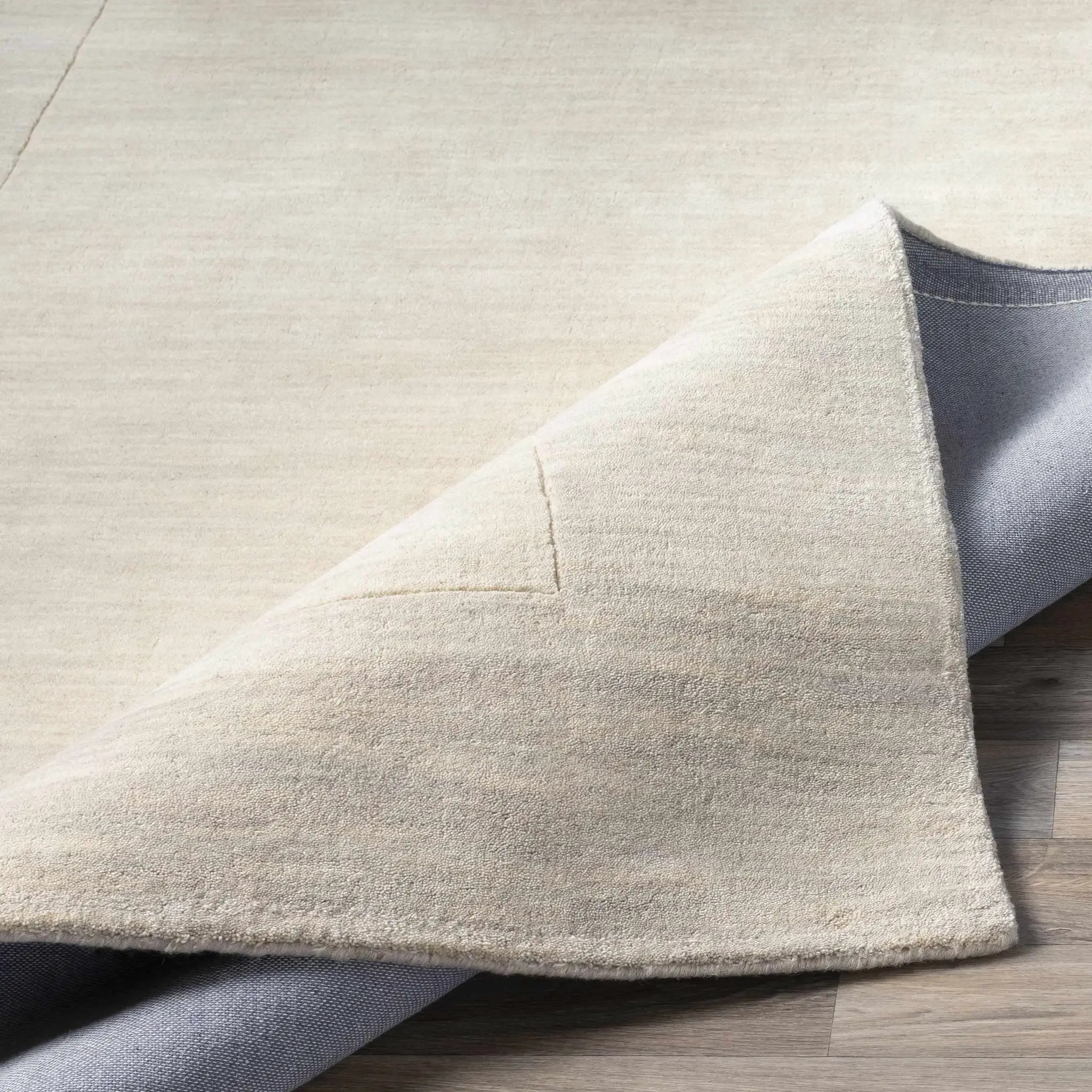 Bordered Solid Beige Cream Wool Rug by Boutique Rugs