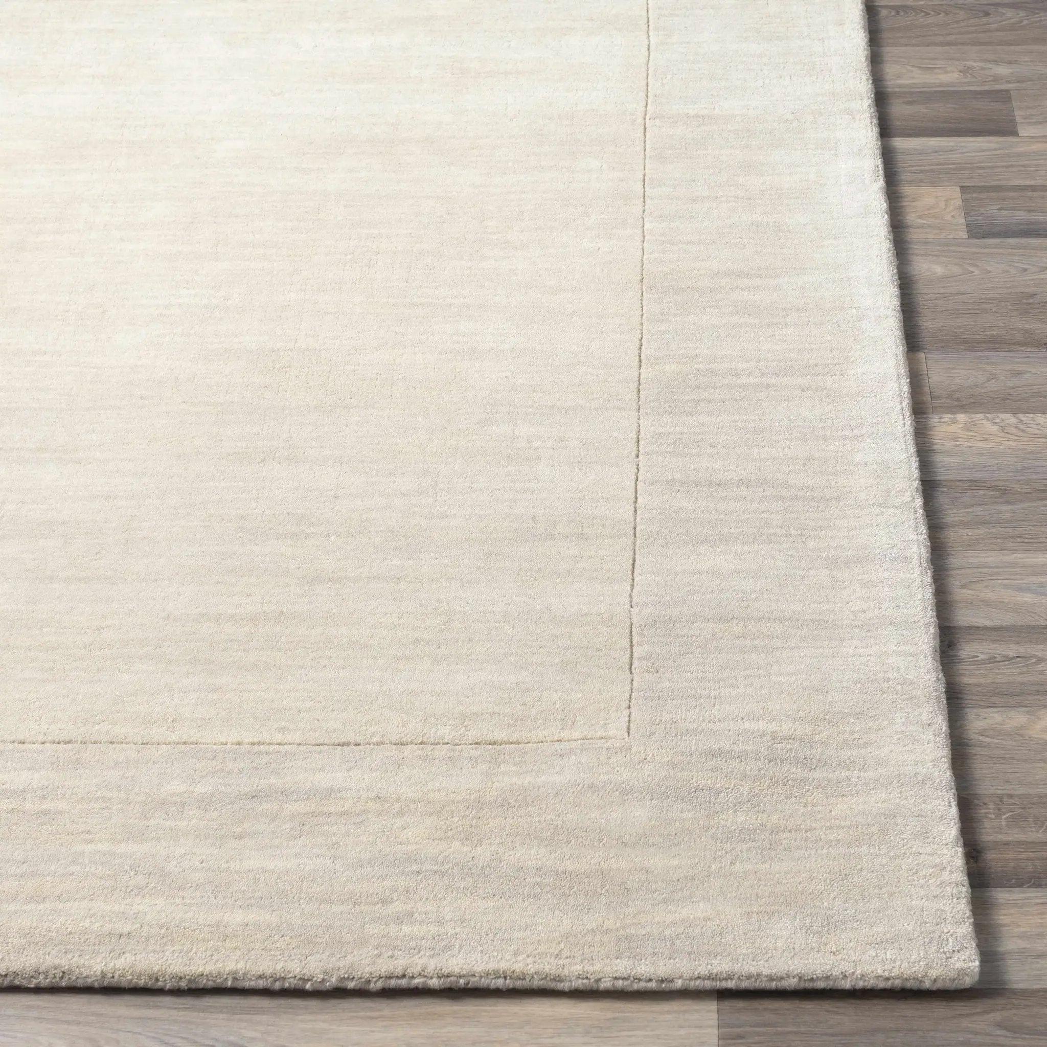 Bordered Solid Beige Cream Wool Rug by Boutique Rugs