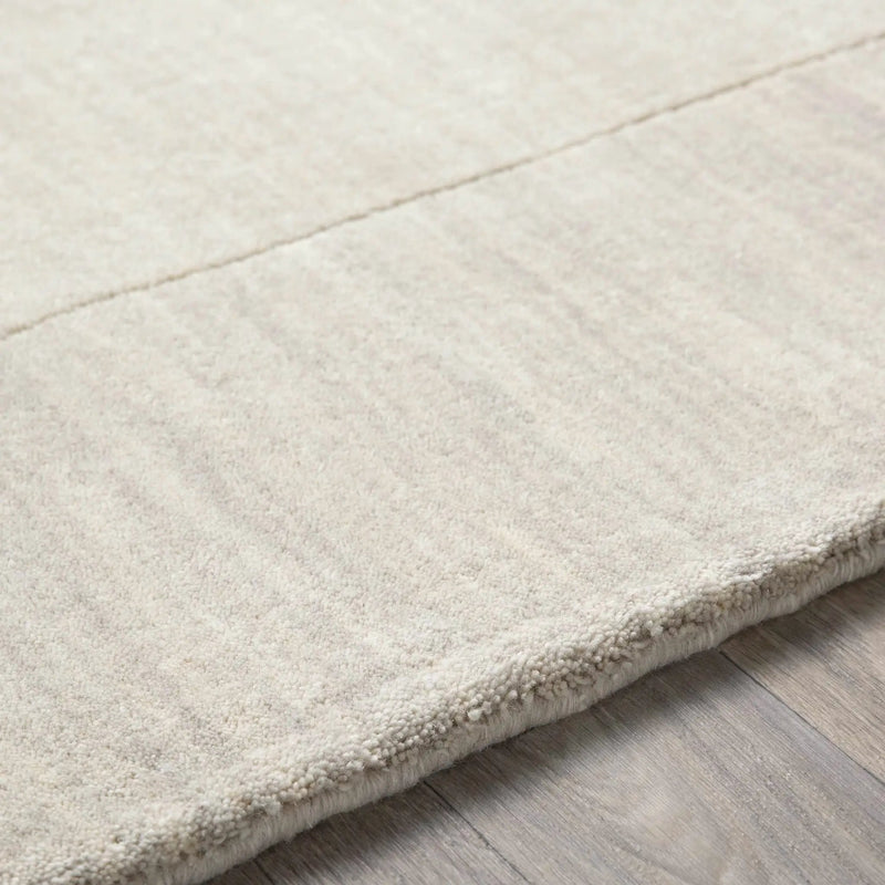 Bordered Solid Beige Cream Wool Rug by Boutique Rugs
