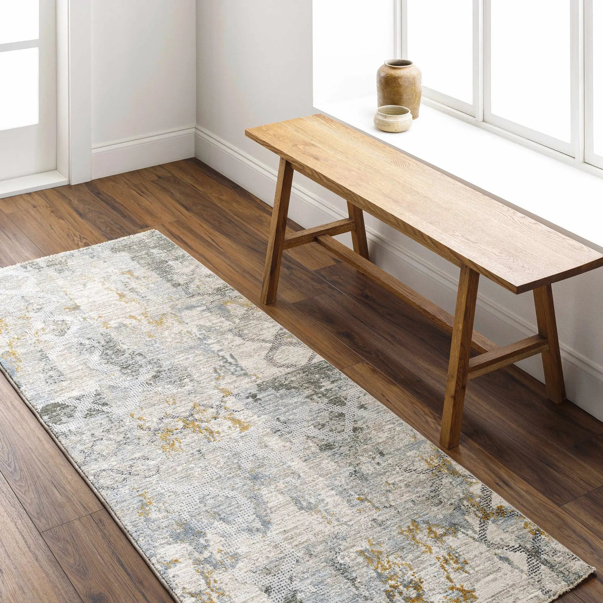 Adlai Textured Rug with Fringes, installed in a room 4